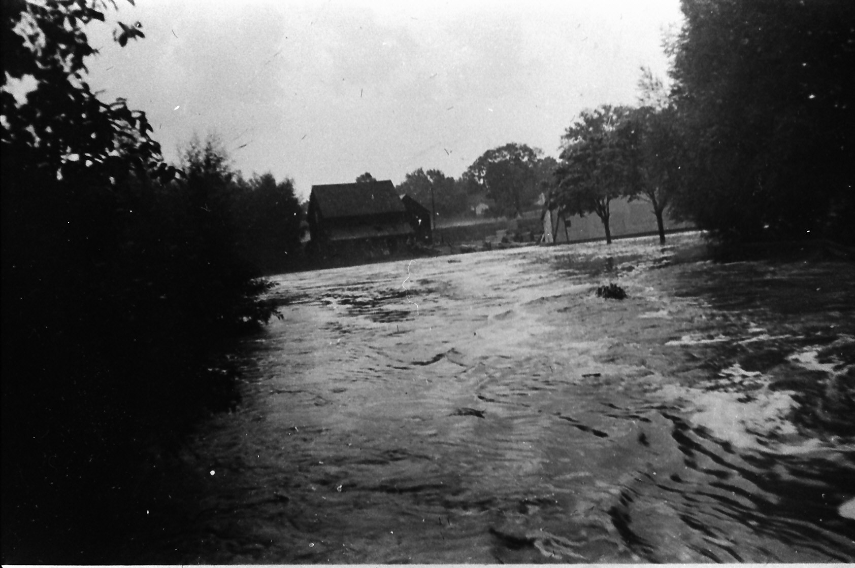 Flood, mill in the background